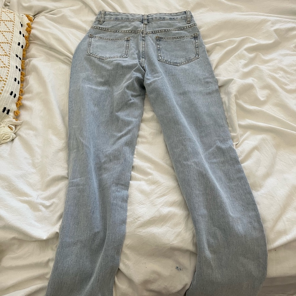 Light blue ripped jeans